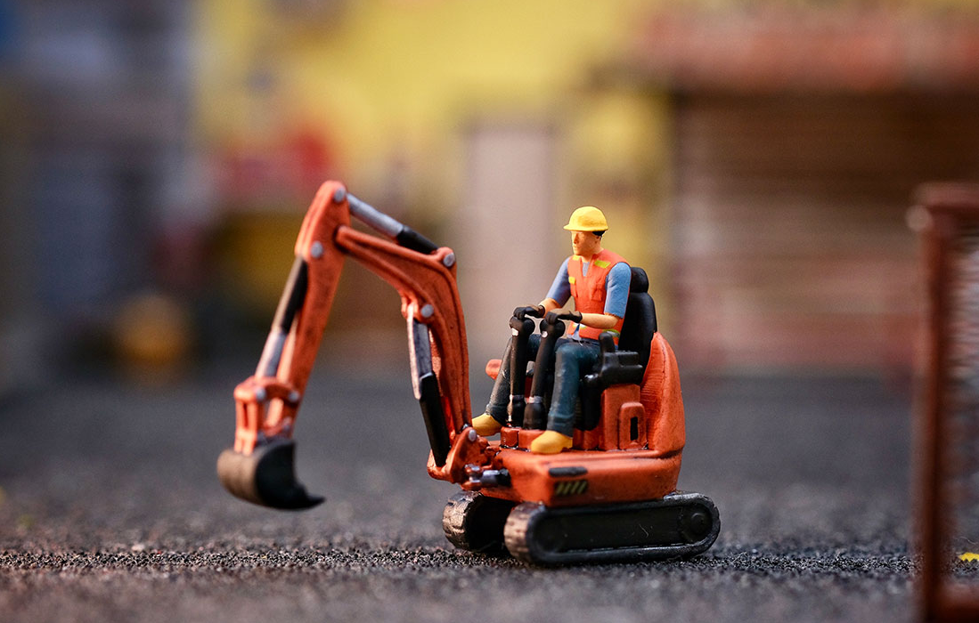 Figurenset Bauarbeiter auf Kleinbagger
